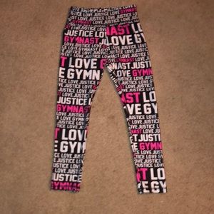 Justice. 12. Whit, black, pink. Worn 2. No rips.